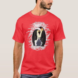 Camiseta La familia de los pingüinos en el hielo y la nieve