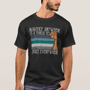 Camiseta La Injusticia En Cualquier Lugar Es Amenaza Para L