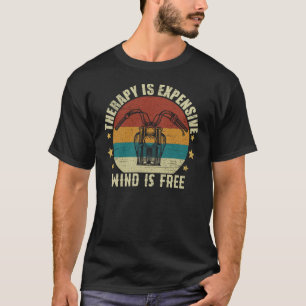 Camiseta La Terapia Es Cara De Viento Es Gratuita