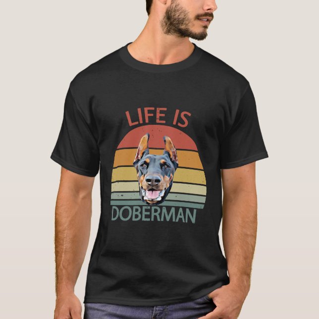 Camiseta La vida es Adopción de Perro Doberman Refugio Anim (Anverso)