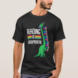 Camiseta Leer es lectura fundamental de libros de dinosauri
