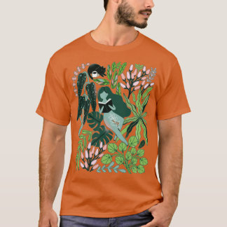 Camiseta Leyendo chicas entre las plantas con gatos en el j