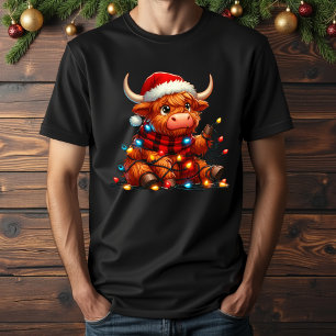 Camiseta lindas luces de navidades de vacas en las tierras 