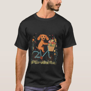 Camiseta Lindo perro dachshund montando una bicicleta flore