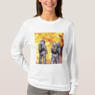 Camiseta Los bomberos extinguen un fuego de aviones