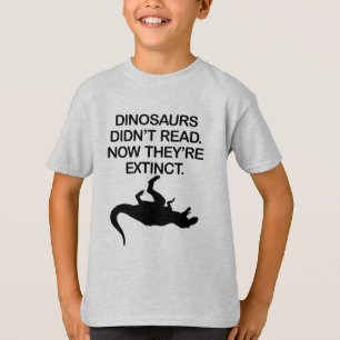 CAMISETA LOS DINOSAURIOS NO LEÍAN. AHORA ESTÁN EXTINTOS.