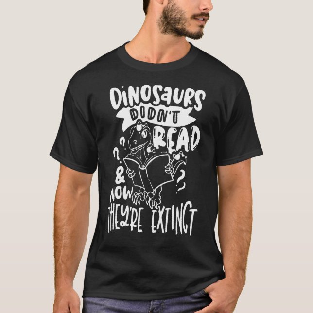 Camiseta Los dinosaurios no leían ahora están leyendo muy (Anverso)