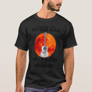 Camiseta Los Hombres Nunca Subestiman A Un Hombre Con Una G