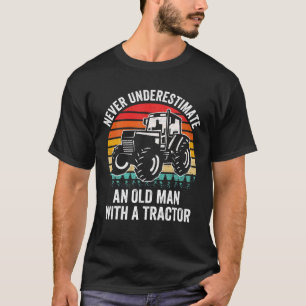 Camiseta Los Hombres Nunca Subestiman A Un Viejo Con Un Tra