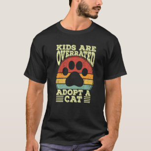 Camiseta Los Niños Son Sobrevalorados Adopta Un Gato Para M