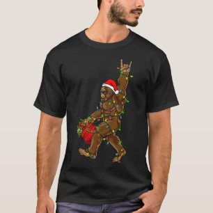 Camiseta Luces de Navidad de Santa Bigfoot Divierten Roca S
