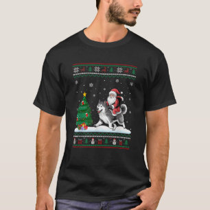 Camiseta Luces feas de árbol de Navidad Santa montando Ma a