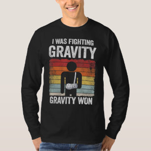 Camiseta Luchaba Contra Gravity Gravity Ganó Hand Bro