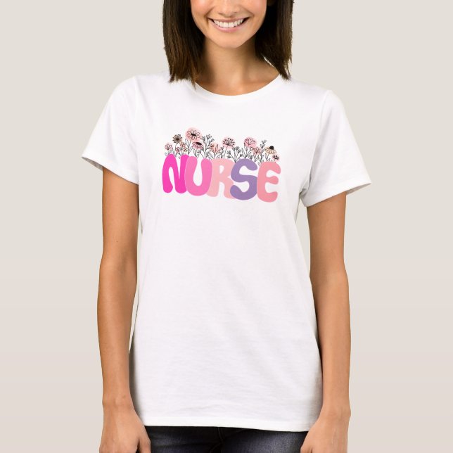 Camiseta Magnífica tipografía "enfermera" con floral vibran (Anverso)
