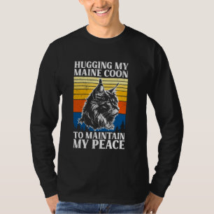 Camiseta Maine Coon ABRAZANDO MI MONEDA PRINCIPAL PARA MANT