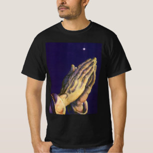 Camiseta Manos antiguas orando con la estrella de Belén