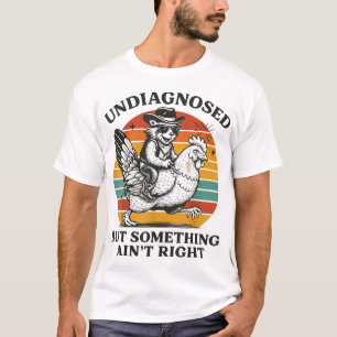 Camiseta Mapache Algo No Está Bien Sin Diagnosticar