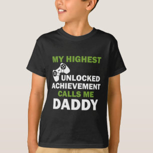 Camiseta Mi logro más alto desbloqueado me llama papá