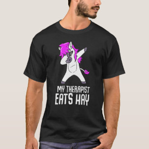 Camiseta Mi terapeuta come heno cabalga