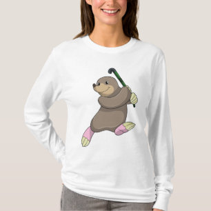Camiseta Mole en hockey con bate de hockey