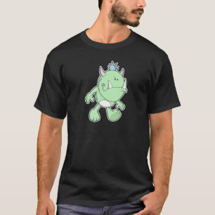 Camiseta monstruo verde lindo con colmillos haciendo pucher