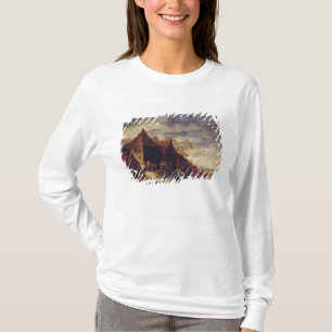 Camiseta Mujer delante de una cabaña