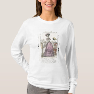 Camiseta Mujer joven en un vestido rosado del organdí