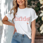 Camiseta Naranja PINK Disco Bride Bridal Party hen DO Shirt<br><div class="desc">Retroceda en el tiempo con nuestra colección Retro Disco Ball Bridal Shower Invitation & Decor. Sumérjase en la nostalgia de los años 70 con arcos beige y gris mudos, realzados por fuentes purpurinas plateadas. La emblemática bola de disco retro ocupa el centro del escenario, evocando una era de glamour disco,...</div>