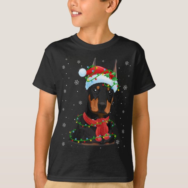 Camiseta Navidades alumbran al perro doberman Santa Hat Sca (Anverso)