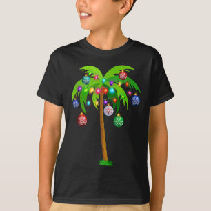 Camiseta Navidades alumbran palmeras divertidas Hawaii Beac