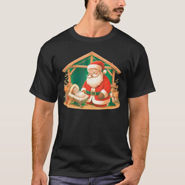 Camiseta Navidades arrodillando a Santa Claus con el Niño J (Anverso)