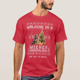 Camiseta Navidades Dachshund caminando en una tierra de mar
