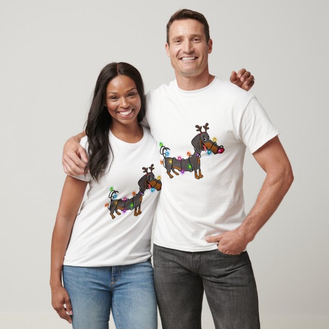 Camiseta Navidades de Dachshund iluminan a los vendedores d (Unisexo)