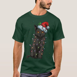 Camiseta Navidades de gato negro iluminan a Chris un extrañ
