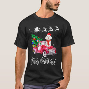 Camiseta Navidades de perro caniche viajan en camión rojo