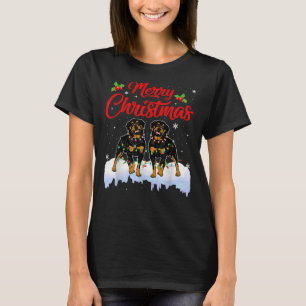 Camiseta Navidades de perro de Rottweiler iluminan a Gorra 