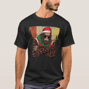 Camiseta Navidades de pie en bicicleta Santa Hat Sasquatch 