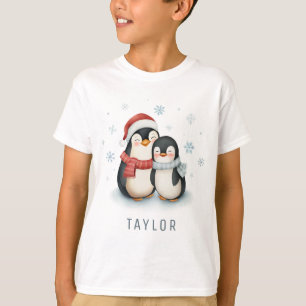 Camiseta Navidades de pingüinos con temas de invierno