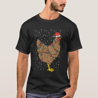 Camiseta Navidades de pollo en Santa Hat iluminan divertida