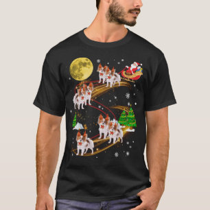 Camiseta Navidades de renos de Papillon viajando en Santa N
