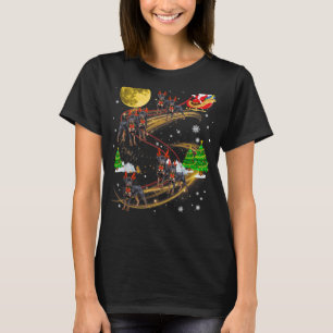 Camiseta Navidades de renos de Rottweiler viajan en Santa X