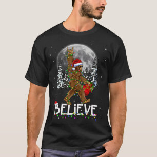 Camiseta Navidades de Santa Bigfoot iluminan Funny Sasquatc