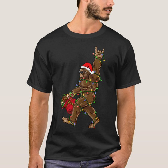 Camiseta Navidades de Santa Bigfoot iluminan sasquatc graci (Anverso)