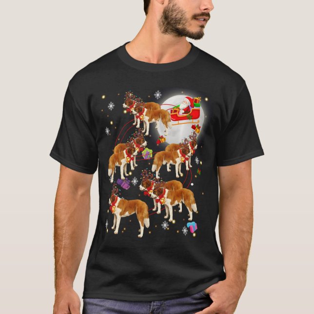 Camiseta Navidades de Santa Claus Riding Saint Bernard Paja (Anverso)