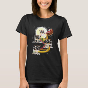 Camiseta Navidades de Santa Claus viajando en bote lechero 