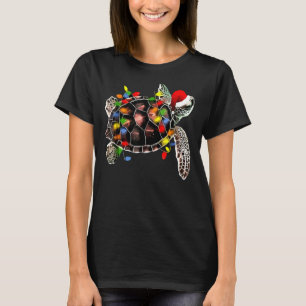 Camiseta Navidades de tortugas marinas iluminan a Chris de