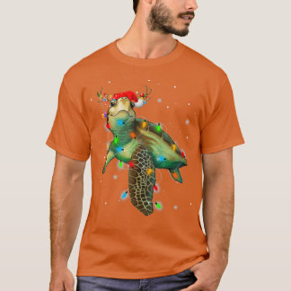 Camiseta Navidades de tortugas marinas iluminan divertida m