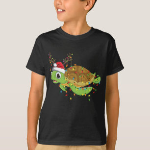 Camiseta Navidades de tortugas marinas iluminan divertida m