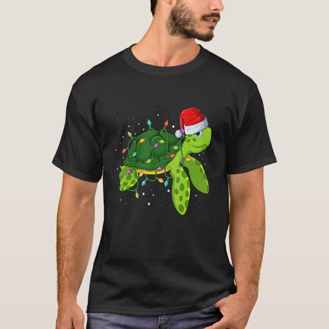 Camiseta Navidades de tortugas marinas iluminan Feliz Navid (Anverso)