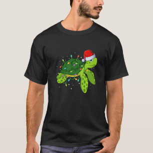 Camiseta Navidades de tortugas marinas iluminan Feliz Navid